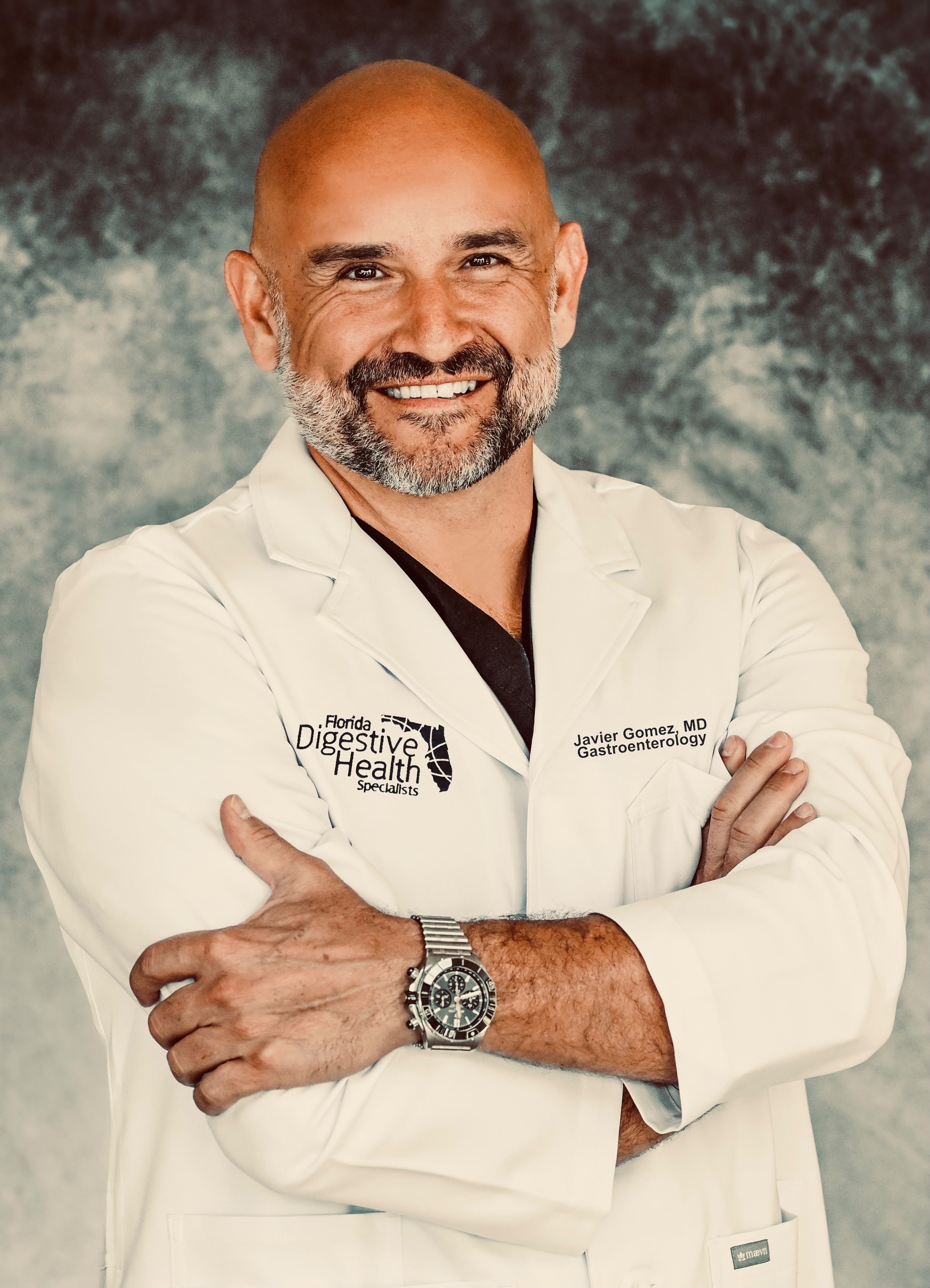 Dr. Javier Gomez, gastroenterologist, in his lab coat